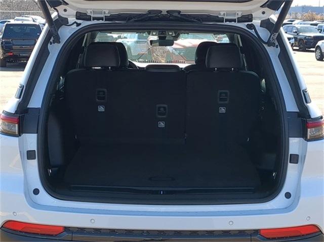 Photo of 2025 Bright White Clearcoat Jeep Grand Cherokee