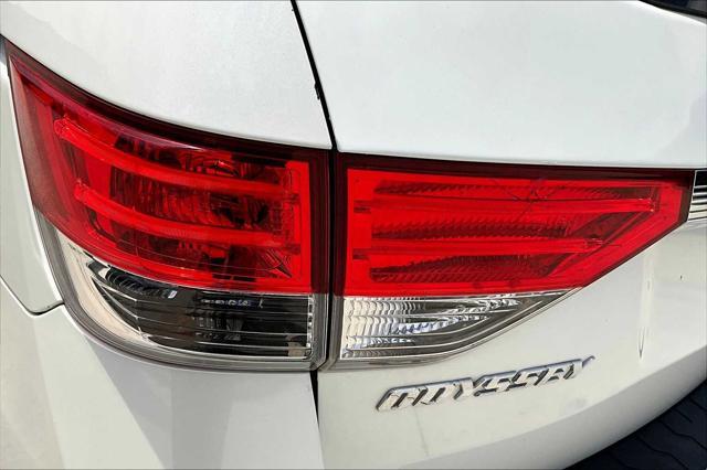 Photo of 2015 White Diamond Pearl Honda Odyssey