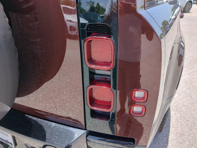Photo of 2025 Sedona Red Land Rover Defender