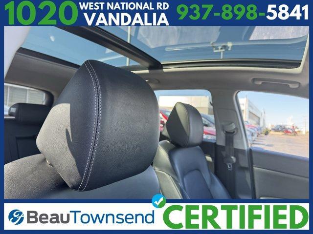 Photo of 2017 Black Cherry Kia Sportage