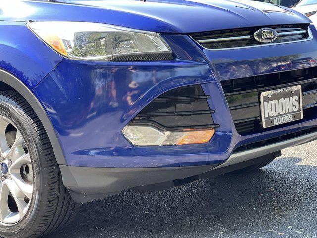 Photo of 2016 Deep Impact Blue Ford Escape