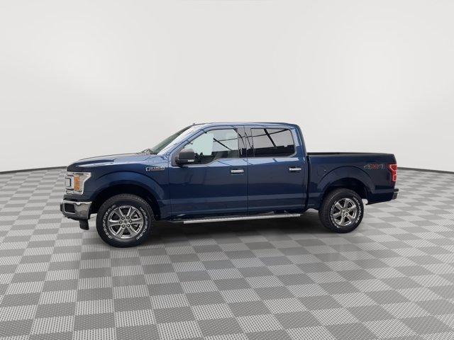 Photo of 2018 Blue Jeans Metallic Ford F-150