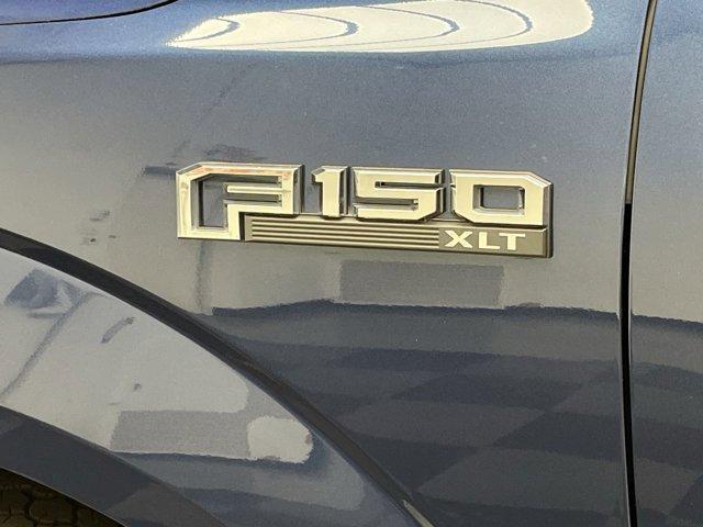 Photo of 2018 Blue Jeans Metallic Ford F-150