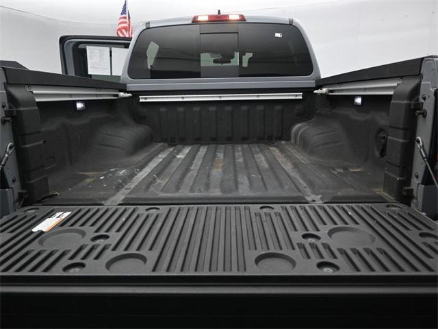 Photo of 2023 Boulder Gray Pearl Nissan Frontier