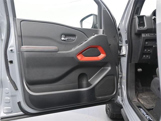 Photo of 2023 Boulder Gray Pearl Nissan Frontier