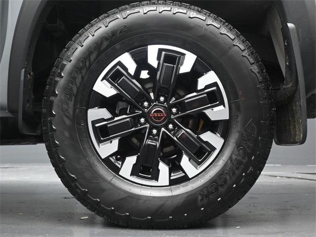 Photo of 2023 Boulder Gray Pearl Nissan Frontier