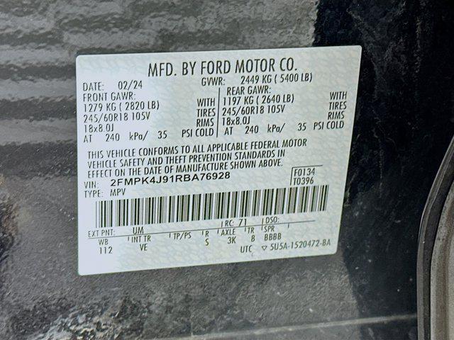 Photo of 2024 Agate Black Metallic Ford Edge