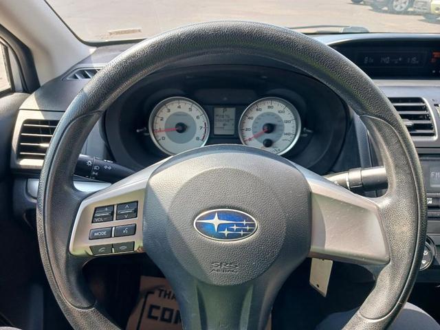 Photo of 2014 Ice Silver Metallic Subaru Impreza