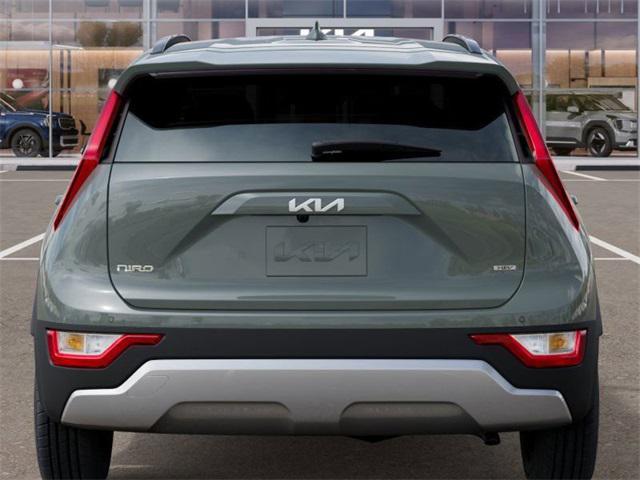 Photo of 2025 Cityscape Green Kia Niro