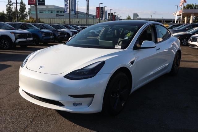 Photo of 2021 Pearl White Multi Tesla Model 3