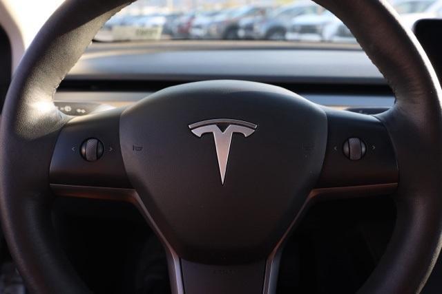 Photo of 2021 Pearl White Multi Tesla Model 3