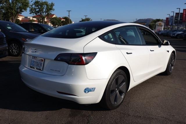 Photo of 2021 Pearl White Multi Tesla Model 3