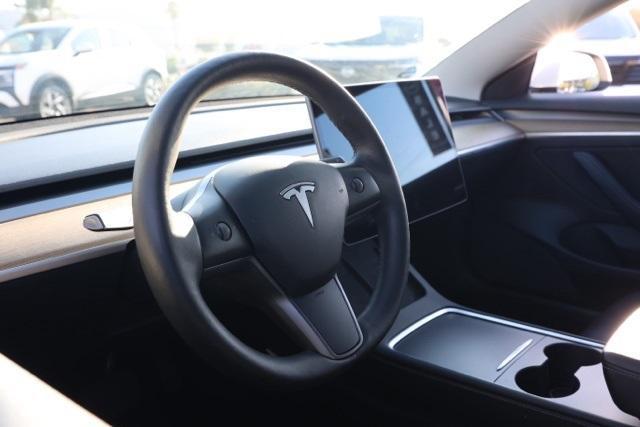 Photo of 2021 Pearl White Multi Tesla Model 3