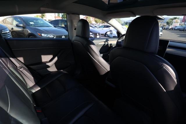 Photo of 2021 Pearl White Multi Tesla Model 3
