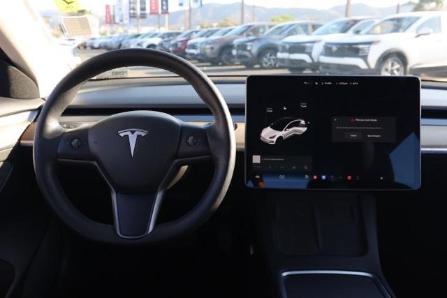 Photo of 2021 Pearl White Multi Tesla Model 3