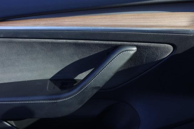 Photo of 2021 Pearl White Multi Tesla Model 3