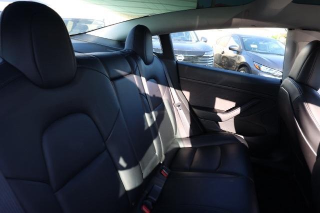 Photo of 2021 Pearl White Multi Tesla Model 3
