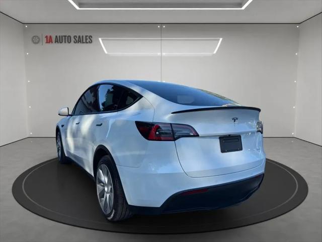 Photo of 2020 Pearl White Multi-Coat Tesla Model Y