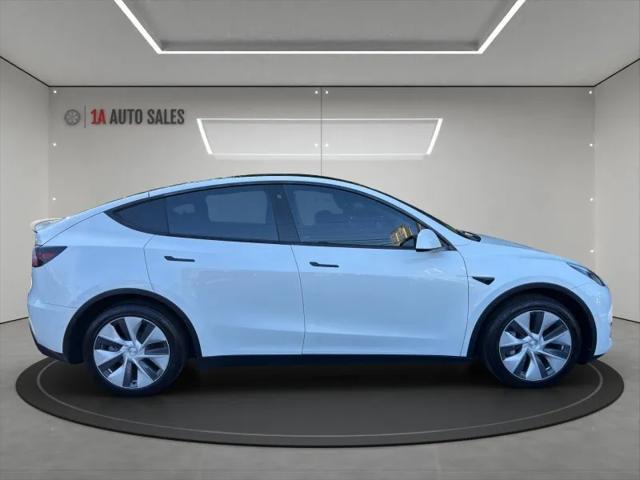 Photo of 2020 Pearl White Multi-Coat Tesla Model Y