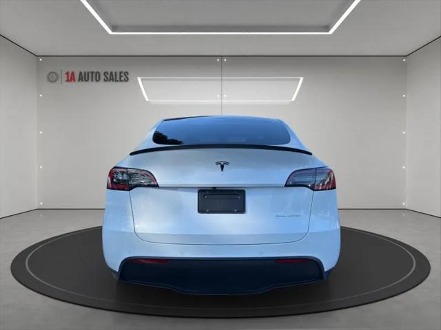 Photo of 2020 Pearl White Multi-Coat Tesla Model Y