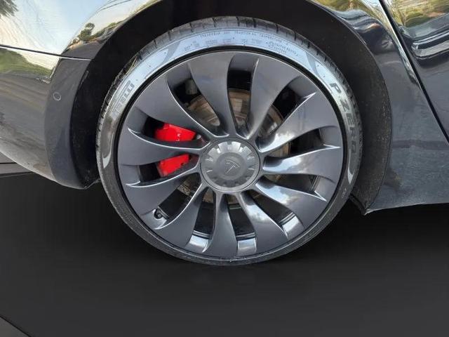 Photo of 2022 Solid Black Tesla Model 3