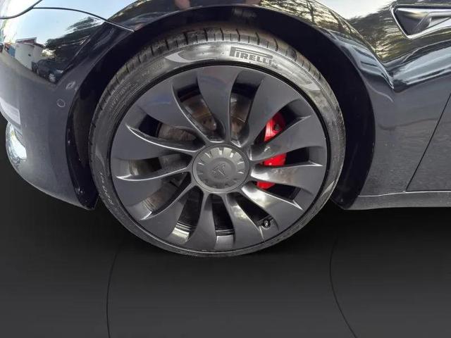 Photo of 2022 Solid Black Tesla Model 3