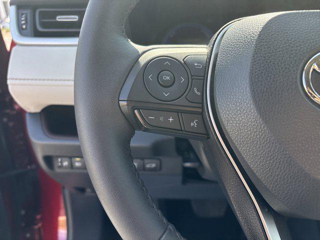 Photo of 2023 Ruby Flare Pearl Toyota RAV4 Hybrid