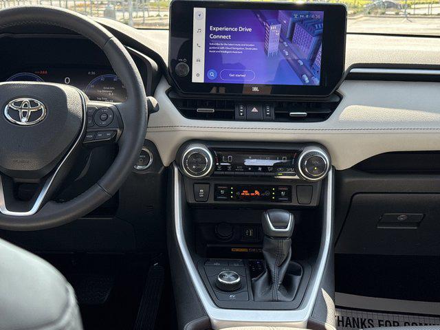 Photo of 2023 Ruby Flare Pearl Toyota RAV4 Hybrid