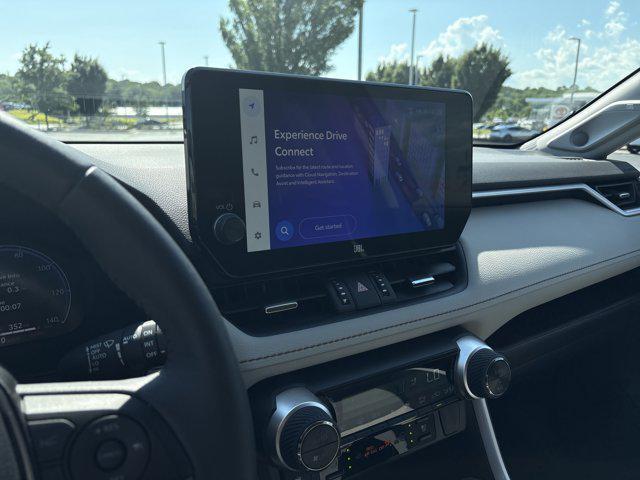 Photo of 2023 Ruby Flare Pearl Toyota RAV4 Hybrid