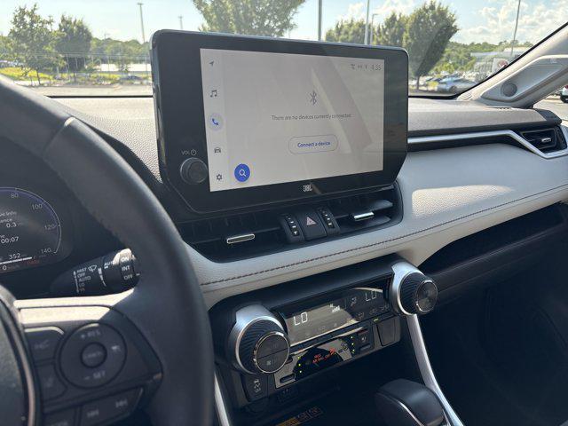 Photo of 2023 Ruby Flare Pearl Toyota RAV4 Hybrid