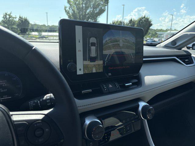 Photo of 2023 Ruby Flare Pearl Toyota RAV4 Hybrid