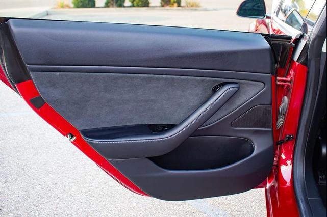 Photo of 2018 Red Multi-Coat Tesla Model 3