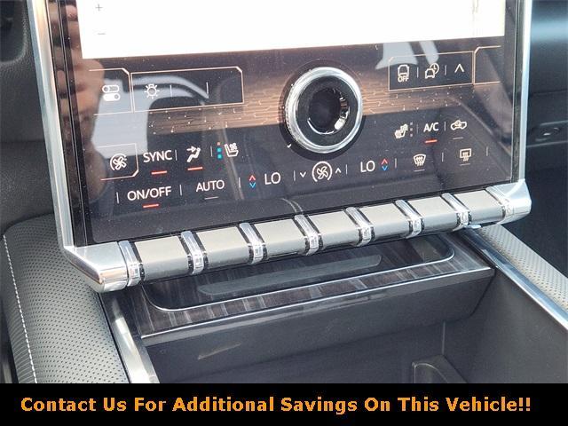 Photo of 2025 Summit White GMC Sierra EV