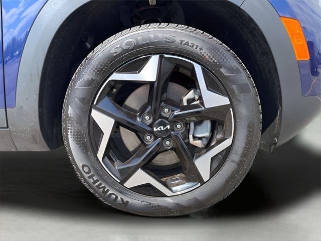 Photo of 2024 Dark Ocean Blue Kia Seltos