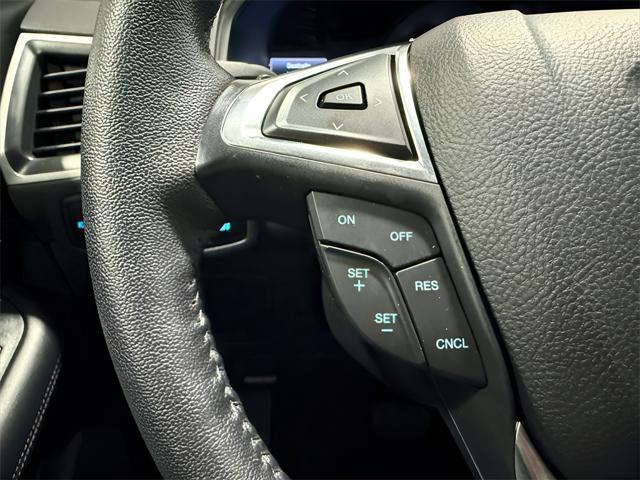 Photo of 2024 Black Metallic Ford Edge