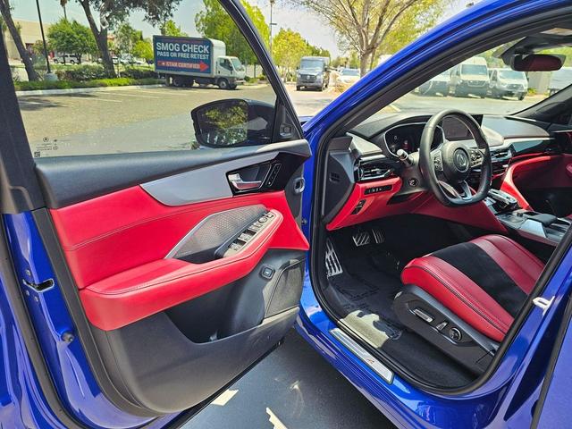 Photo of 2024 Apex Blue Pearl Acura MDX