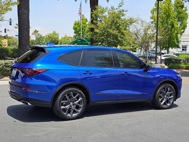 Photo of 2024 Apex Blue Pearl Acura MDX