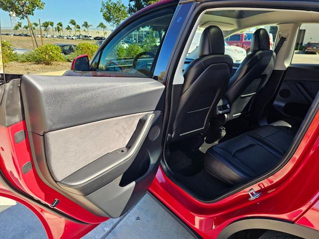 Photo of 2023 Red Multi-Coat Tesla Model Y