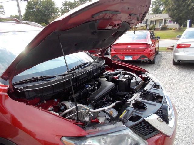 Photo of 2015 Ruby Red Metallic Nissan Rogue