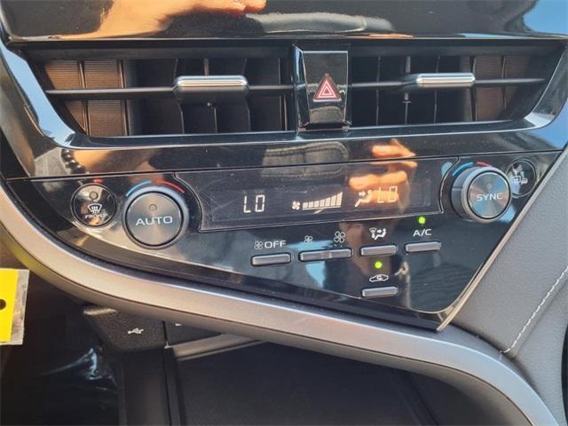 Photo of 2022 Midnight Black Metallic Toyota Camry