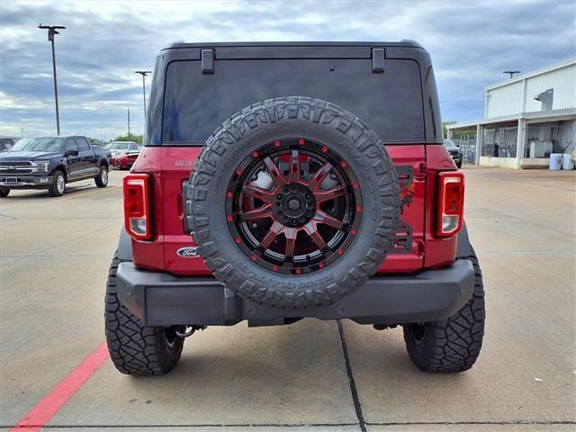 Photo of 2025 Ruby Red Metallic Tinted Clearcoat Ford Bronco