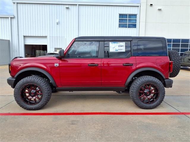 Photo of 2025 Ruby Red Metallic Tinted Clearcoat Ford Bronco