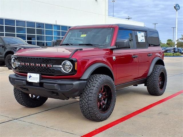 Photo of 2025 Ruby Red Metallic Tinted Clearcoat Ford Bronco
