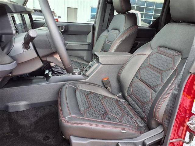 Photo of 2025 Ruby Red Metallic Tinted Clearcoat Ford Bronco