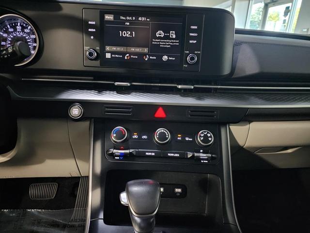 Photo of 2024 Aurora Black Pearl Kia Carnival