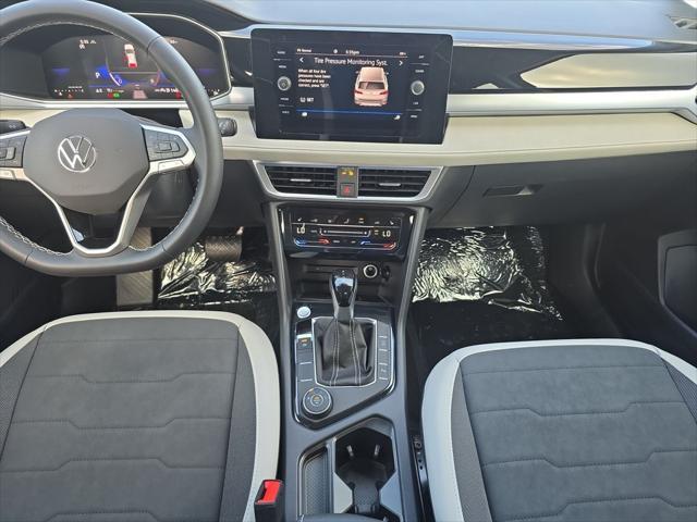 Photo of 2025 Silver Metallic Volkswagen Taos
