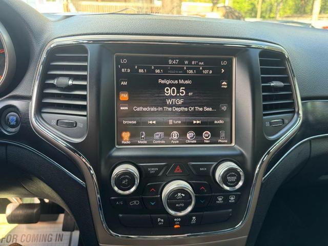 Photo of 2014 Bright White Clearcoat Jeep Grand Cherokee