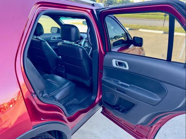 Photo of 2015 Ruby Red Metallic Tinted Clearcoat Ford Explorer