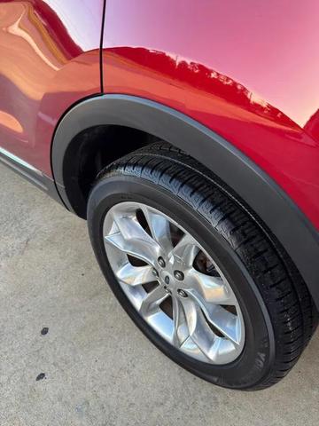 Photo of 2015 Ruby Red Metallic Tinted Clearcoat Ford Explorer