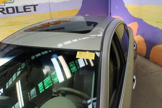 Photo of 2014 Khaki Nissan Altima